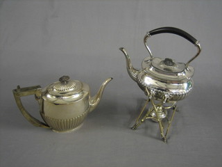 A  Britannia metal tea kettle with demi-reeded decoration and do. teapot