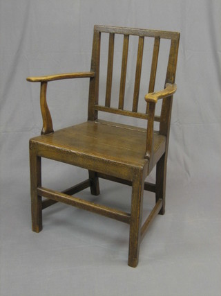 An 18th/19th Century Country elm stick and bar back carver chair