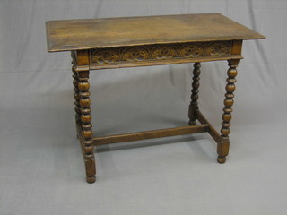 A Victorian honey oak side table fitted a drawer, raised on bobbin turned supports with H framed stretcher 41"