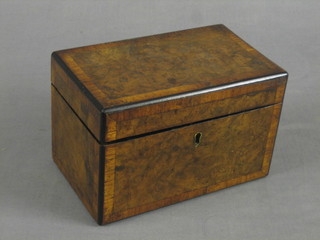 A Victorian figured walnut and cross-banded twin compartment tea caddy with hinged lid 7"