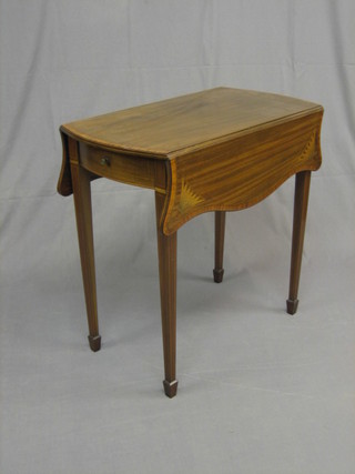 A handsome Edwardian Sheraton revival Pembroke table, the top crossbanded and inlaid ebony and satinwood stringing, the corners inlaid stylised flower heads, fitted a frieze drawer and raised on square tapering supports ending in spade feet 27 1/2"