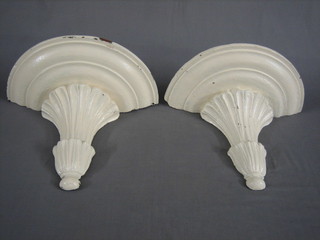 A pair of 19th Century white painted mahogany wall brackets, raised on fluted columns 15"
