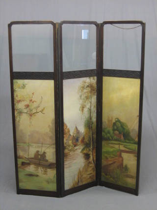 An Edwardian mahogany 3 fold dressing screen, the upper section with glazed panels, the base with oil painted panels - scenes from the Upper Thames taken from Silvery Thames (1 glass panel f)