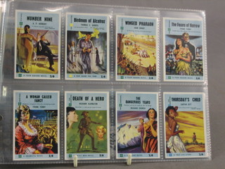 A  set of Wills Wonders of the Past 1926 and Historic Events 1912, a set of Wills Overseas Dominions Canada and Australia cigarette cards  and a set of 4 square George Dobbie 1959 cigarette cards