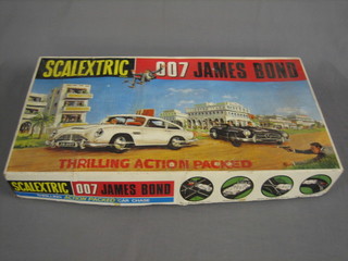 A James Bond Scalextric set  complete with 2 cars and 2 handsets