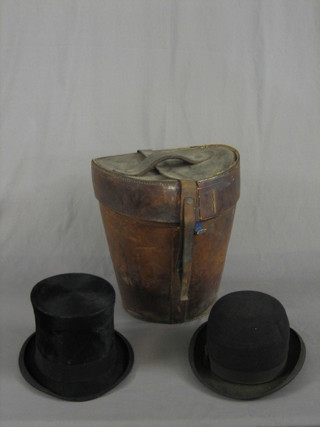 A gentleman's black top hat by Christie and a gentleman's black bowler hat contained in a leather top hat box (hinge f)