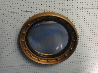 A Georgian style circular convex wall mirror contained in a gilt ball studded frame 20"