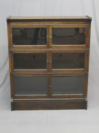 A 19th/20th Century oak 4 tier Globe Wernicke style bookcase 35"
