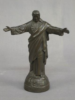 A bronze figure of standing Christ with hands outstretched, the base marked Sacre Coeur de Jesus 8"