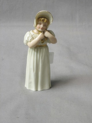 A Royal Worcester candle snuffer in the form of a bonnetted lady, the base with green Worcester mark and pattern registration mark 5 1/2"