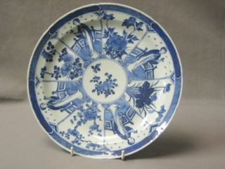 A 19th Century Oriental blue and white porcelain segmented plate, decorated flowers and figures, the reverse with 4 character mark 10"