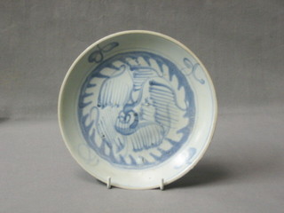 A circular blue and white porcelain plate 7", together with a certificate of authenticity