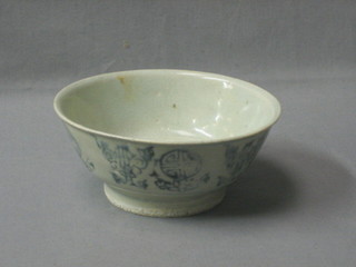 A circular blue and white rice bowl 6"