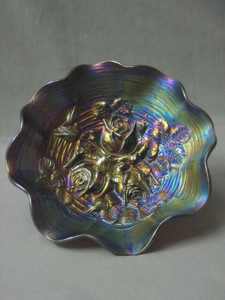A purple Carnival glass dish decorated roses with wavy border 9"