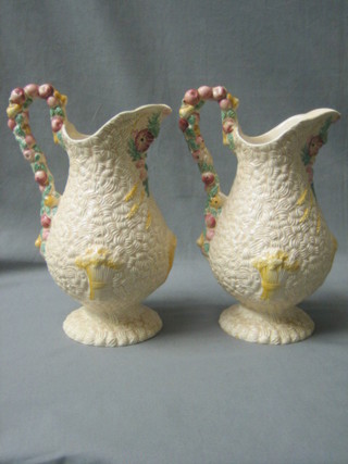 A pair of Clarice Cliff Harvestware jugs the base with green Clarice Cliff rubber stamp mark, 10" (handles f and r)