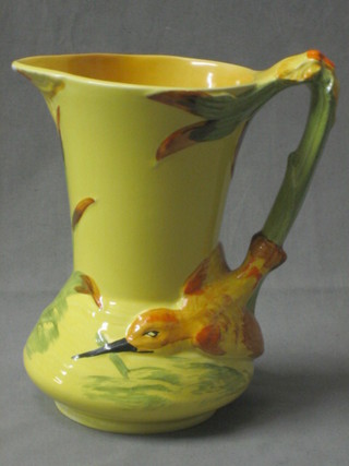 A Burleighware jug the handle in the form of a diving Kingfisher 8"