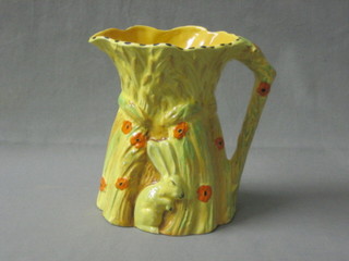 A Burleighware jug in the form of stylised wheatsheaf decorated a rabbit 7"
