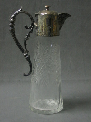 An Edwardian cut glass claret jug with silver plated mounts