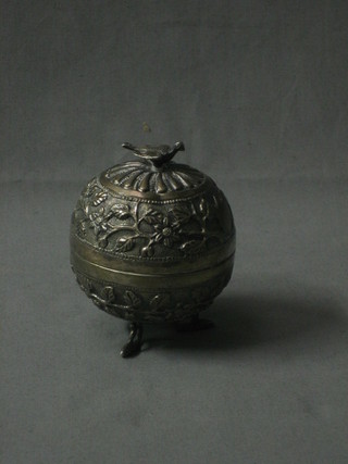 An Indian spear shaped silver jar and cover with bird finial, raised on 3 dolphin supports 4 ozs