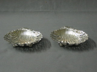 A handsome pair of Victorian  pierced silver scallop shaped bon bon dishes, raised on bun feet, Sheffield 1898 3 ozs