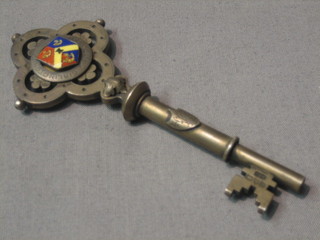 A silver and enamel presentation key, presented to Francis Wiley Esq. on the occasion of the opening of the Exhibition of The Girlington Conservative Club, March 1906, Chester 1902