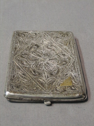 An Eastern silver filigree cigarette case 3 ozs