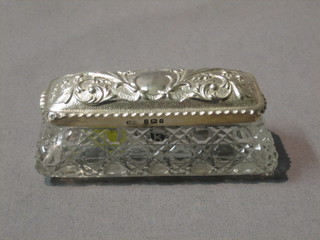 An Edwardian rectangular cut glass dressing table jar with embossed silver lid, Birmingham 1903, 4 1/2"