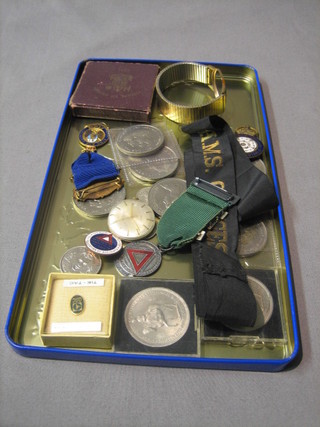 An HMS Ganges cap title, a 1951 Festival of Britain crown, 2 Elizabeth II crowns, various other crowns, a West Ridings of Yorkshire Special Constabulary lapel badge, safe driving medal etc and a gold cased wristwatch by J W Benson (f)