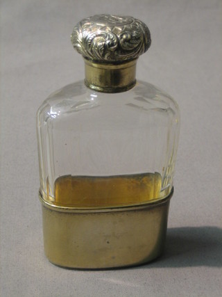 A Victorian cut glass hip flask with silver gilt cap and detachable cover, London 1893