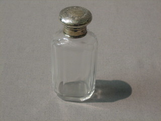 A Victorian faceted glass scent bottle with silver collar, London 1891