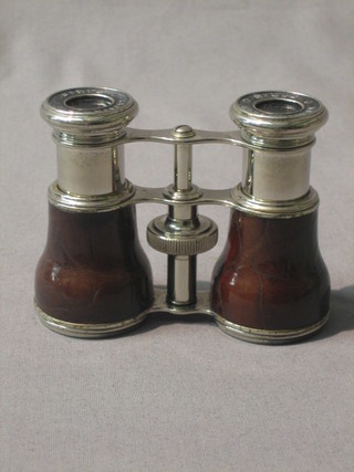 A pair of 19th/20th Century chromium plated opera glasses marked Lemaire Paris