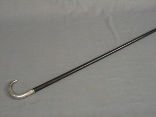 A Continental hardwood walking stick with embossed silver handle