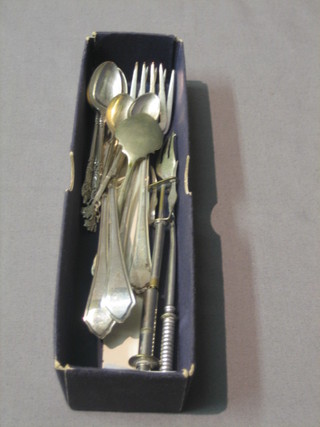A pair of silver fish knives and forks, 3 silver apostle teaspoons, 2 Eastern silver spoons, a plated jam spoon and 2 pickle forks