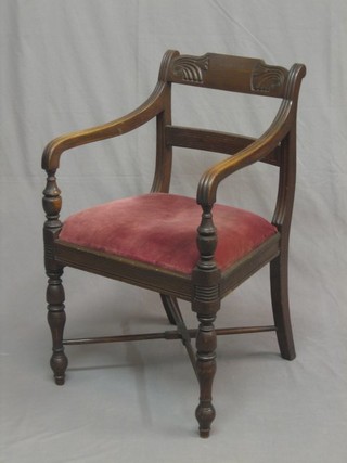 A 19th Century Georgian style mahogany carved bar back desk chair with plain mid rail and upholstered drop in seat, raised on turned supports
