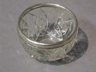 A circular cut glass bowl with silver mount 4"