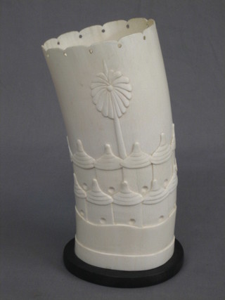 A lamp formed from a section of carved ivory decorated buildings 11"