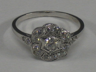 A lady's 18ct white gold cluster design dress ring set diamonds (approx. 1/2ct)
