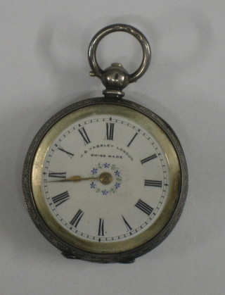 A Continental open faced pocket watch with enamelled dial contained in a silver case (second hand f)