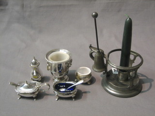 A pewter chamber stick 3", a 3 piece silver plated condiment set, a plated salt and 1 other item