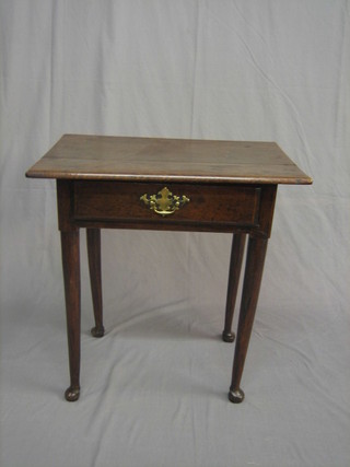 An 18th Century oak low boy fitted a drawer, raised on club supports 26 1/2"