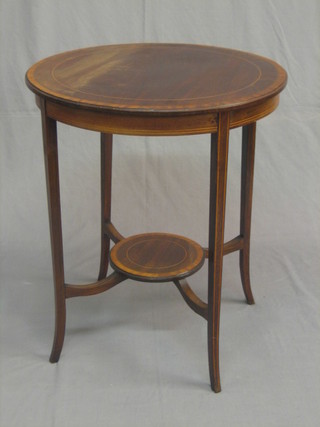 An Edwardian circular inlaid bleached mahogany 2 tier occasional table raised on tapering supports 24"