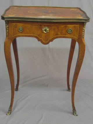 A 19th Century  Kingwood side table of serpentine outline, the top with parquetry inlay decorated fruit, fitted a frieze drawer and raised on French cabriole supports 21" (substantial damage to top)
