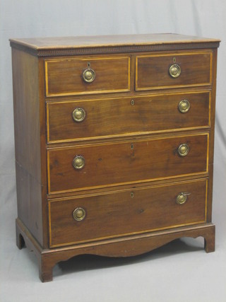 A Georgian mahogany chest with crossbanded top and dentil apron, fitted 2 short and 3 long drawers, raised on bracket feet 37" (cut)