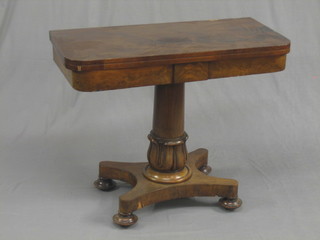 A William IV mahogany D shaped card table, raised on a turned column with triform base 36" (some veneer damaged)