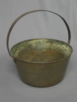 A 19th Century brass preserving pan with iron handle