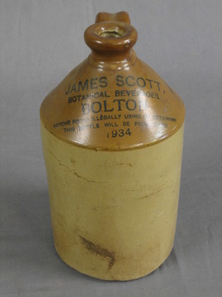 A stoneware bottle marked James Scott Botanical Beverages Bolton 1934