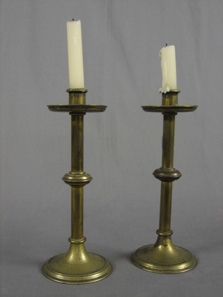 A pair of brass candlesticks 10"
