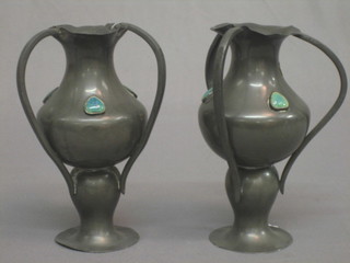 A pair of Art Nouveau pewter 3 handled vases of club form decorated hardstones, the base marked Pewter 1086, 6 1/2" (some corrosion)