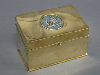 A 19th Century polished brass stationery box with hinged lid, the lid inlaid a Jasperware panel 7"