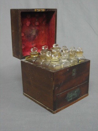 A 19th Century apothecaries cabinet fitted 14 various glass bottles, some with contents, the base fitted a drawer 7"